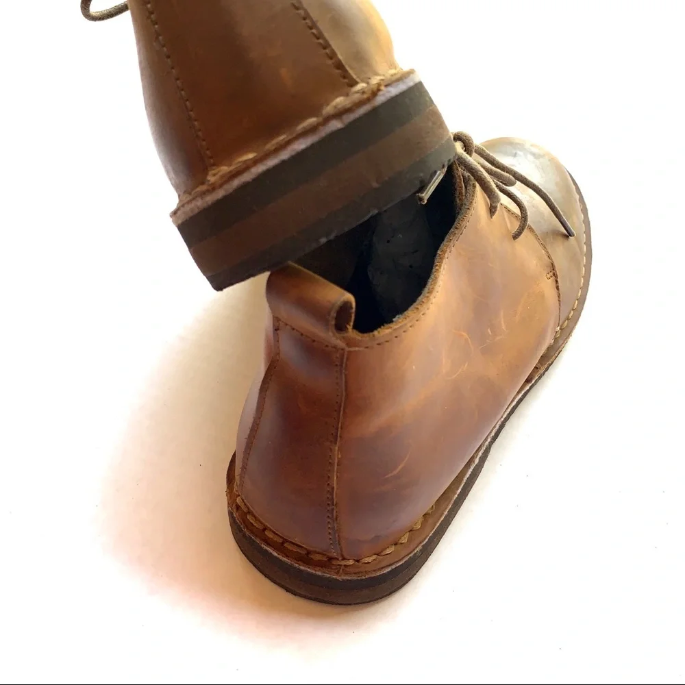 Men's two-eye lace-up shoes in brown, size 12.